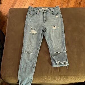 Distressed Light Blue Levi’s Jeans